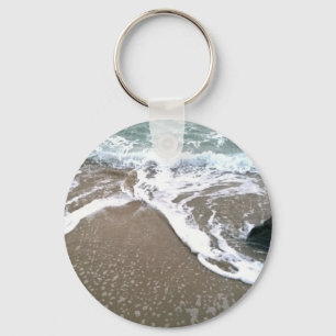Porte-clés The Tide Washing Ashore Over the Rocks