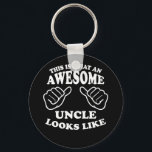 Porte-clés This Is What An Awesome Uncle Looks Like<br><div class="desc">A fun style retro design featuring two hands pointing to the special guy wearing the shirt or item letting everyone know he's an awesome uncle.</div>