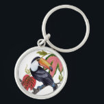 Porte-clés Toco Toucan<br><div class="desc">Toco Toucan I par Melissa Wang. Un toucan unique est perché sur une branche avec des feuilles tropicaux. | 164390Z</div>