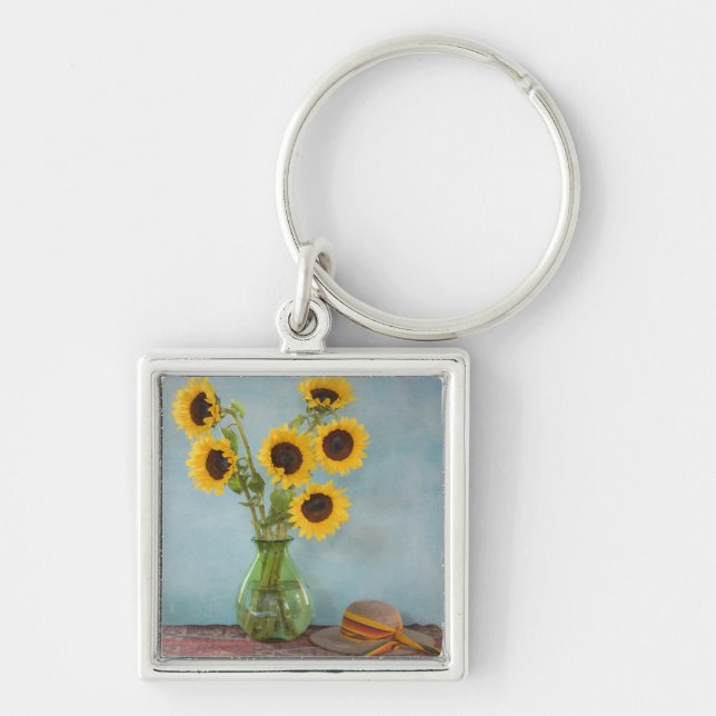 Porte-clés Tournesols dans un vase sur une table (Devant)
