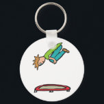 Porte-clés Trampoline<br><div class="desc">La conception du trampoline montre un expert en trampoline effectuant un roulis vers l'avant en plein air avec les genoux relevés jusqu'à la poitrine.  Le trampoline est bien en dessous et le trampoliniste garde les yeux fermement fixés sur la position de rebond éventuelle.</div>