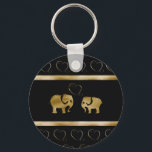 Porte-clés Trendy cute luxury  black /golden elephant in love<br><div class="desc">Trendy cute luxury  black /golden elephant in love design. Sophisticated and artistic color composition. A modern,  unique graphic work of art made for you. You can customize this product by adding your own name  nickname or monogram. Perfect gifts for elephant and unique designs  lovers,   a gift for every occasion.</div>