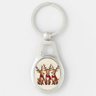 Porte-clés Trio de rennes de Noël mignons avec des écharpes à
