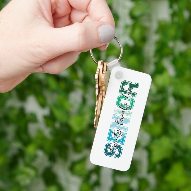 Porte-clés Typographie Senior Bleu Vert 2025 (main)
