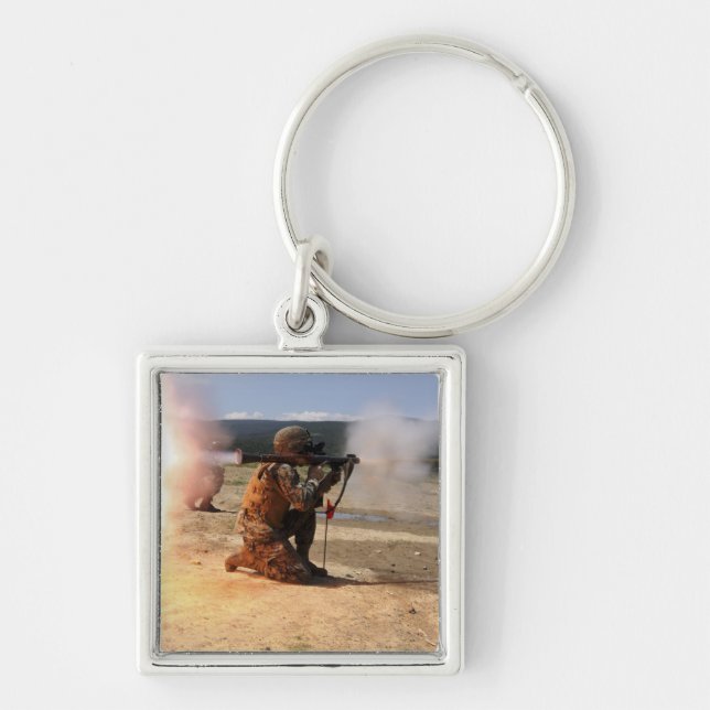 Porte-clés Un agresseur tire une grenade propulsée par fusée (Devant)