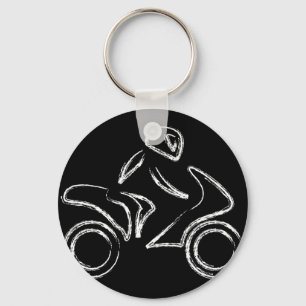 Porte-clés Un cycliste sur une motocyclette
