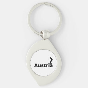 Porte-clés Un footballeur autrichien utilisant dot comme ball