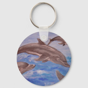 Porte-clés Un morceau de dauphins de saut