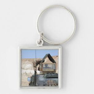 Porte-clés Un soldat instruit un soldat de l'armée irakienne