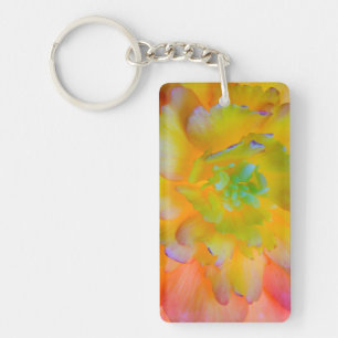Porte-clés Une fleur de begonia lumineuse à contre-jour