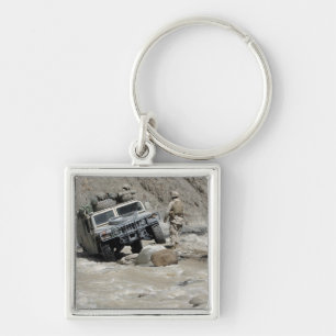 Porte-clés Une marine des USA guidant le conducteur de Humvee