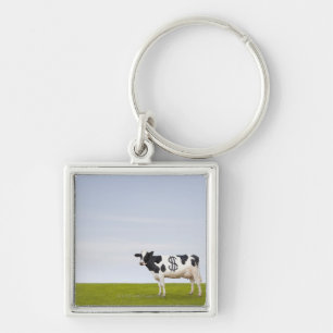 Porte-clés Une vache laitière du Holstein avec des taches