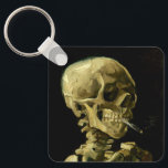 Porte-clés Van Gogh Fumer du squelette<br><div class="desc">Porte - clé représentant la peinture à l’huile de Vincent van Gogh,  Skull of a Skeleton with Burning Cigarette (1885-86). Un grand cadeau pour les amateurs de post-impressionnisme et d'art hollandais !</div>