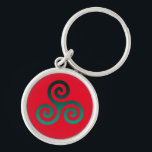Porte-clés Vert Triskele Vivid Rouge<br><div class="desc">Symbole vert Triskele. Le symbole Triskele ou Triskelion se compose de trois spirales ou de trois bras enclenchés,  comme s'il se déplaçait de son centre. Ce symbole celtique de mouvement ou d'action représente les trois mondes : céleste,  physique et spirituel.</div>