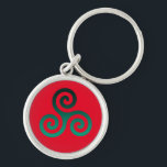 Porte-clés Vert Triskele Vivid Rouge<br><div class="desc">Symbole vert Triskele. Le symbole Triskele ou Triskelion se compose de trois spirales ou de trois bras enclenchés,  comme s'il se déplaçait de son centre. Ce symbole celtique de mouvement ou d'action représente les trois mondes : céleste,  physique et spirituel.</div>