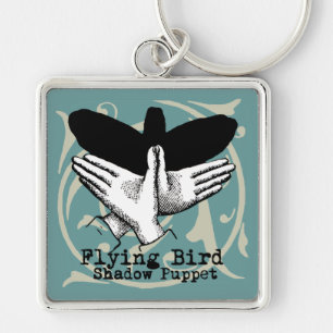 Porte-clés Vintage main de marionnette à l'ombre des oiseaux