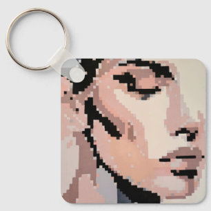 Porte-clés Visage féminin serein aux tons de pixels doux