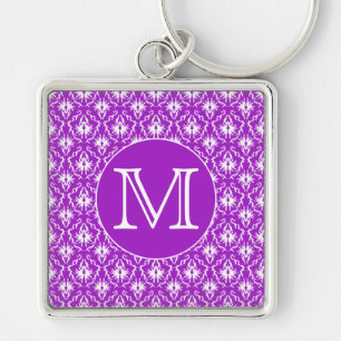 Porte-clés Votre lettre. Modèle pourpre et blanc de damassé