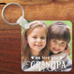 Porte-clés We Love You Grandpa Photo Custom Color<br><div class="desc">Create a special photo keychain gift for a wonderful grandfather featuring 1 or 2 pictures (one on each side) and WE LOVE YOU GRANDPA in a modern, fancy calligraphy typography accented with hearts in your choice of colors to accent your picture. Wonderful gift from his grandchild or grandkids for Grandparent's...</div>
