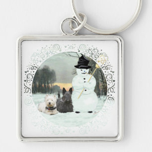 Porte-clés Westie & Scottie construisent un bonhomme de neige