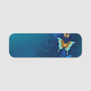 Porte-nom Papillons d'or sur un Arrière - plan bleu