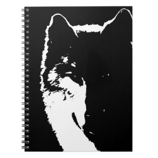 Portrait de loup noir et blanc au Carnet de nuit