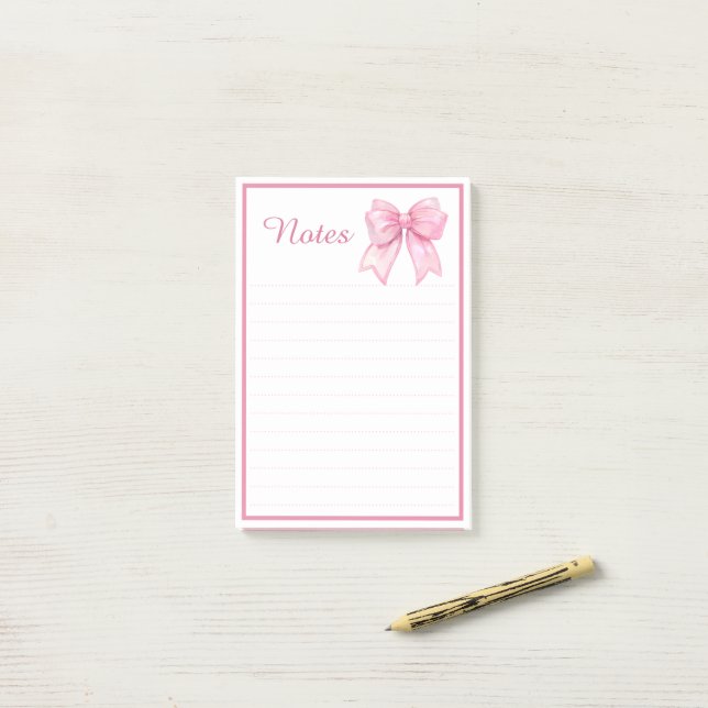 Post-it® Bloc-notes mignon avec ruban rose (Sur un bureau)