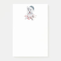 Chien de Noël Husky dans un chapeau de Père Noël