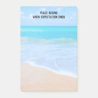 Citation inspirante avec scène de plage tropicale
