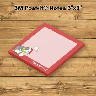 Post-it® manchot de Noël ramassant une boule de neige