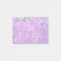 Un champ de marguerites violettes et roses