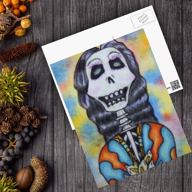 Postale Carte de Jour des Morts (Day of Dead happy lady skeleton orange blue cape flowers on postcard.)