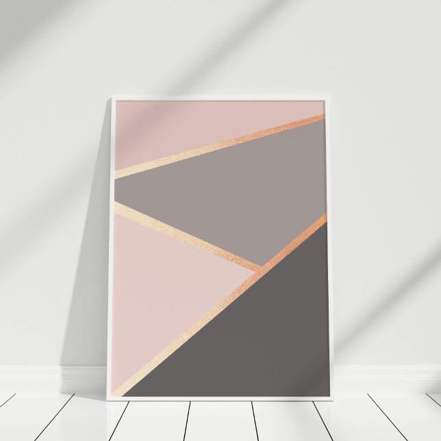 Poster géométrique rose Gold (Rose Gold Geometric Poster in a white frame on a white floor.)