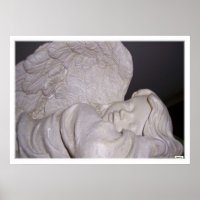 Photographie de statue d'ange endormi