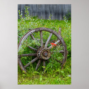 Poster Vieille roue de chariot dans la vieille ville auri