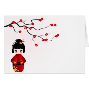 Poupée de Kokeshi sous la branche de Sakura