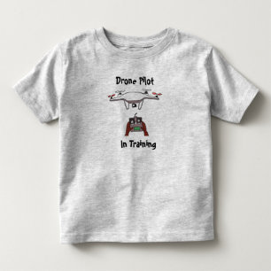 Pour Les Tous Petits Le pilote de bourdon dans le T-shirt de formation
