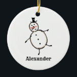 Première décoration de Noël pour bébé personnalisé<br><div class="desc">Cette décoration personnalisée en céramique de Noël à la penderie dispose d'un mignon bonhomme de neige.</div>
