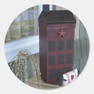 Primitif recueillant des autocollants