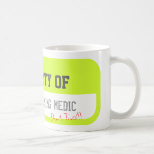 PROPRIÉTÉ d'UNE tasse ASSIDUE de jaune de MÉDEC