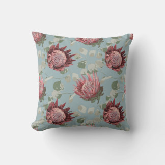 Protea vert et rose sur le Coussin bleu français