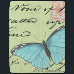 Protection iPad Papillon à ailes bleues sur carte postale Turquois<br><div class="desc">Cette carte postale turquoise porte un message de beauté. Un délicat papillon à ailes bleues repose sur la carte,  obscurcissant une partie du script qu'il contient. Cette impression de Vision Studio ferait un grand ajout à votre maison!</div>