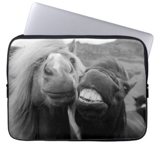 Protection Pour Ordinateur Portable Chevaux de sourire des images de Getty
