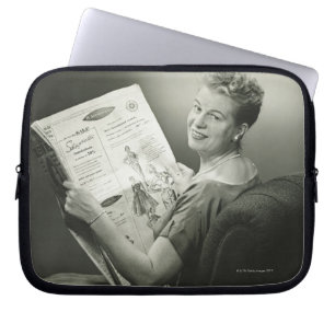 Protection Pour Ordinateur Portable Femme s'asseyant dans la chaise