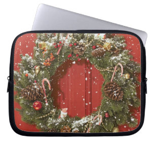 Protection Pour Ordinateur Portable Guirlande de Noël accrochant sur une porte