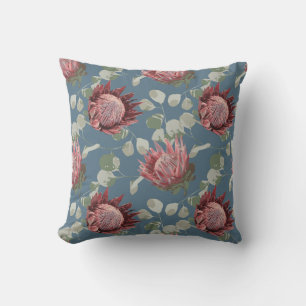 Prothé vert et rose sur coussin d'accents bleu gri