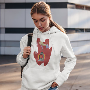 Pull À Capuche Tenant Une Lanterne