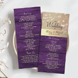Purple Rustic String Lights Programme de mariage<br><div class="desc">Découvrez l'essence de l'élégance intemporelle avec notre carte de programme de mariage moderne et rustique inspirée du bois de grange. Délicatement décoré de riches teintes violettes, dentelle florale dorée complexe et lumières à cordes fantaisistes, il allie harmonieusement charme boho et style contemporain. Chaque détail, du script de calligraphie à la...</div>