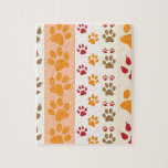 Puzzle Amoureux de les chiens mignons d'empreintes de<br><div class="desc">Concevez avec un motif mignon des empreintes de pattes de chien dans des couleurs oranges et jaunes et chaudes. Cette conception regarde comme s'un chien a marché au-dessus du produit ! Pour des amoureux de les chiens partout.</div>