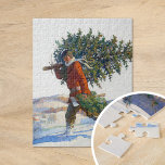 Puzzle Arbre de Noël | N.C. Wyeth<br><div class="desc">Arbre de Noël - Chadd Ford (1922) | La peinture de N.C. Wyeth, Christmas Tree - Chadd Ford, en 1922, capture magnifiquement une scène hivernale de Noël d’un homme portant un arbre fraîchement coupé à travers la campagne enneigée de Chadd Ford, Pennsylvanie. L'homme est chaudement groupé, avec sa position solide...</div>